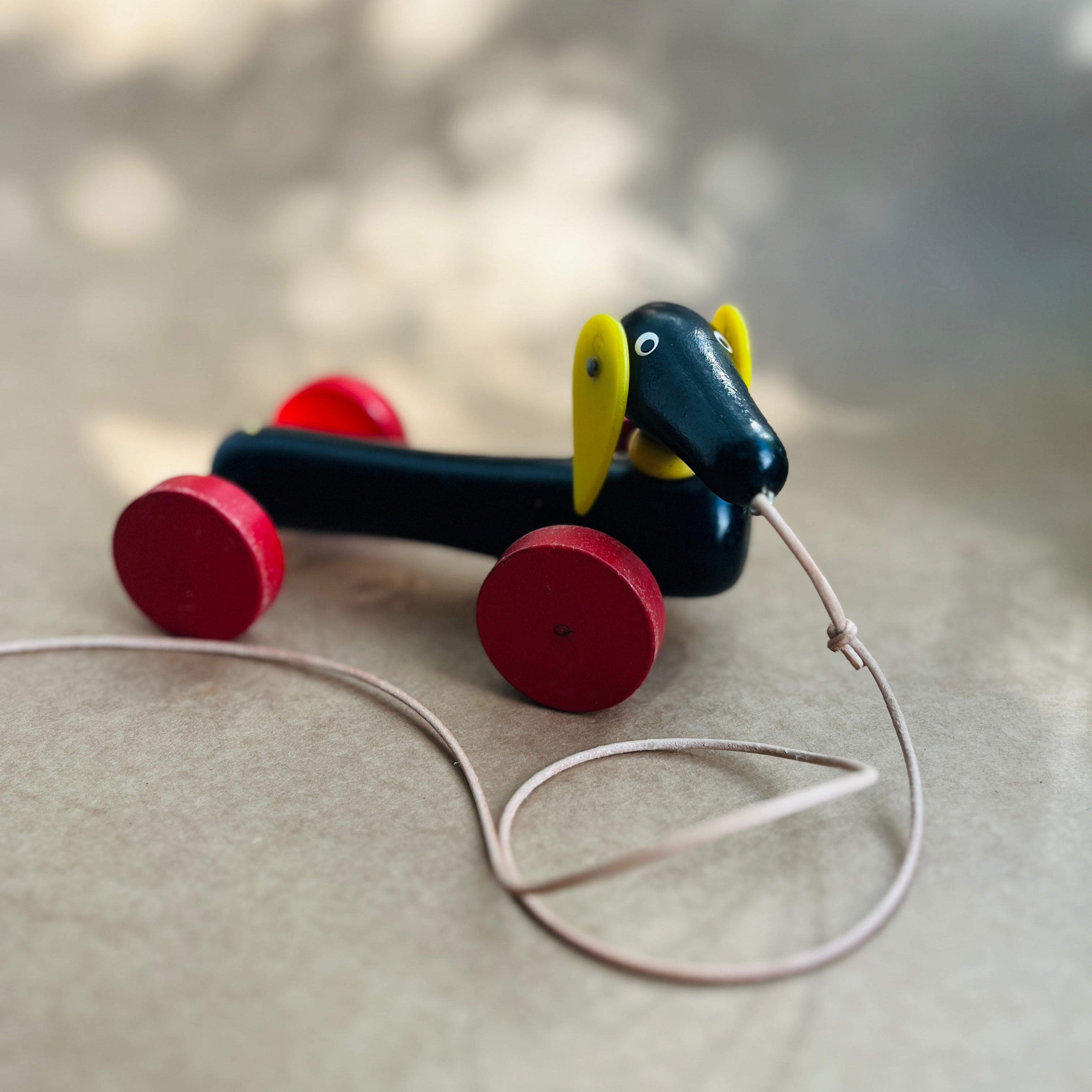 Vintage pull along wooden dachshund