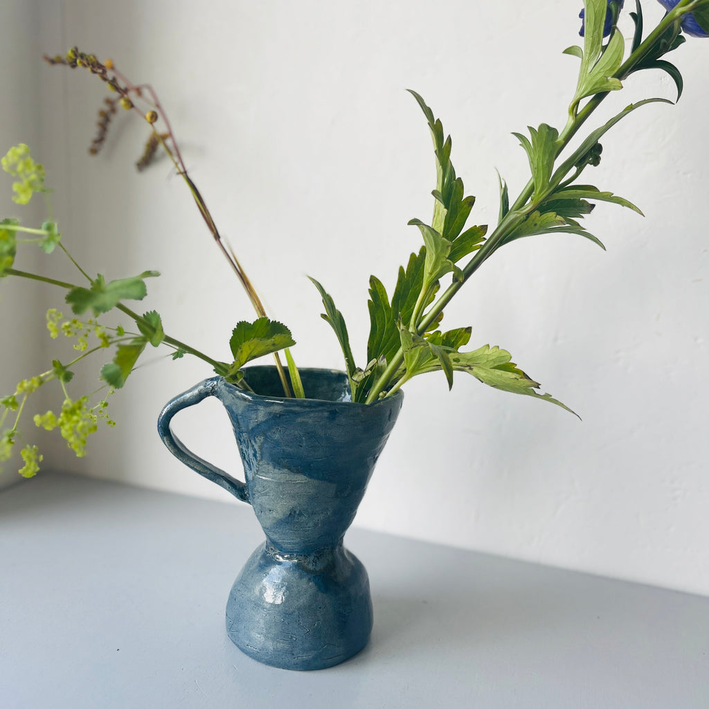 Handmade ceramic vase with ear blue