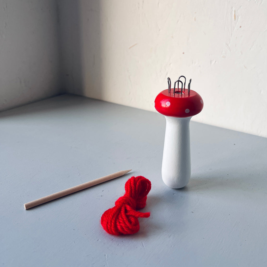 Wooden mushroom knitting spool