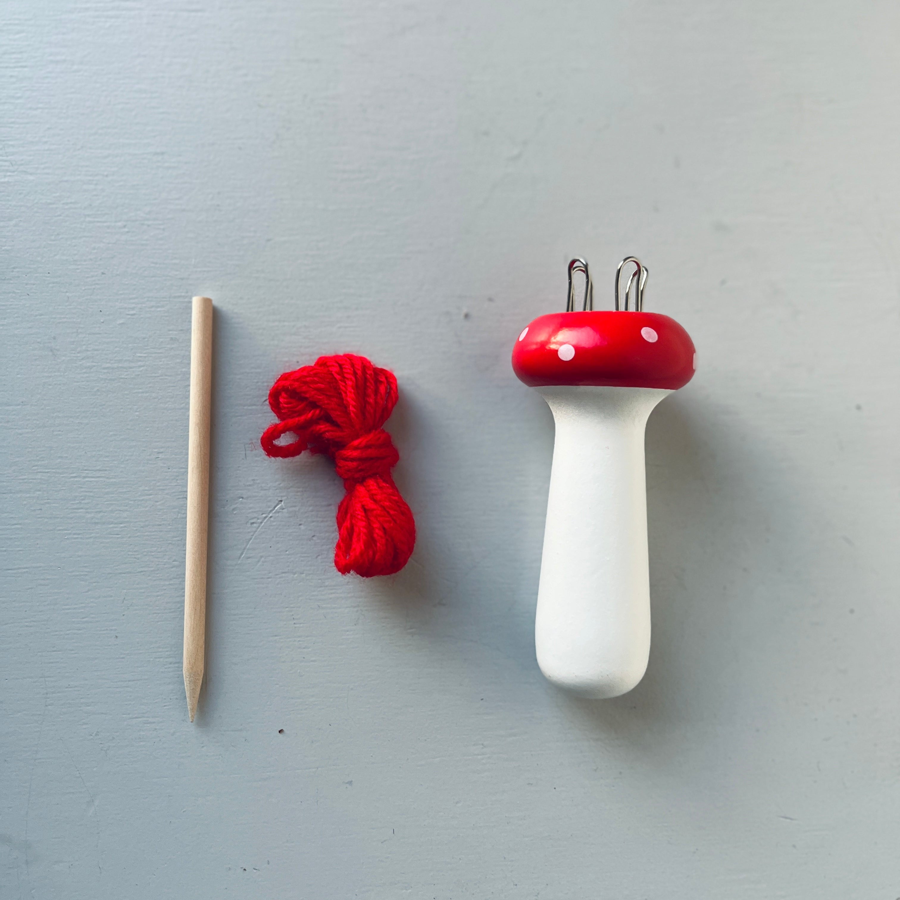 Wooden mushroom knitting spool