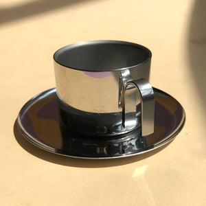 Stainless steel set of vintage coffee cup and saucers