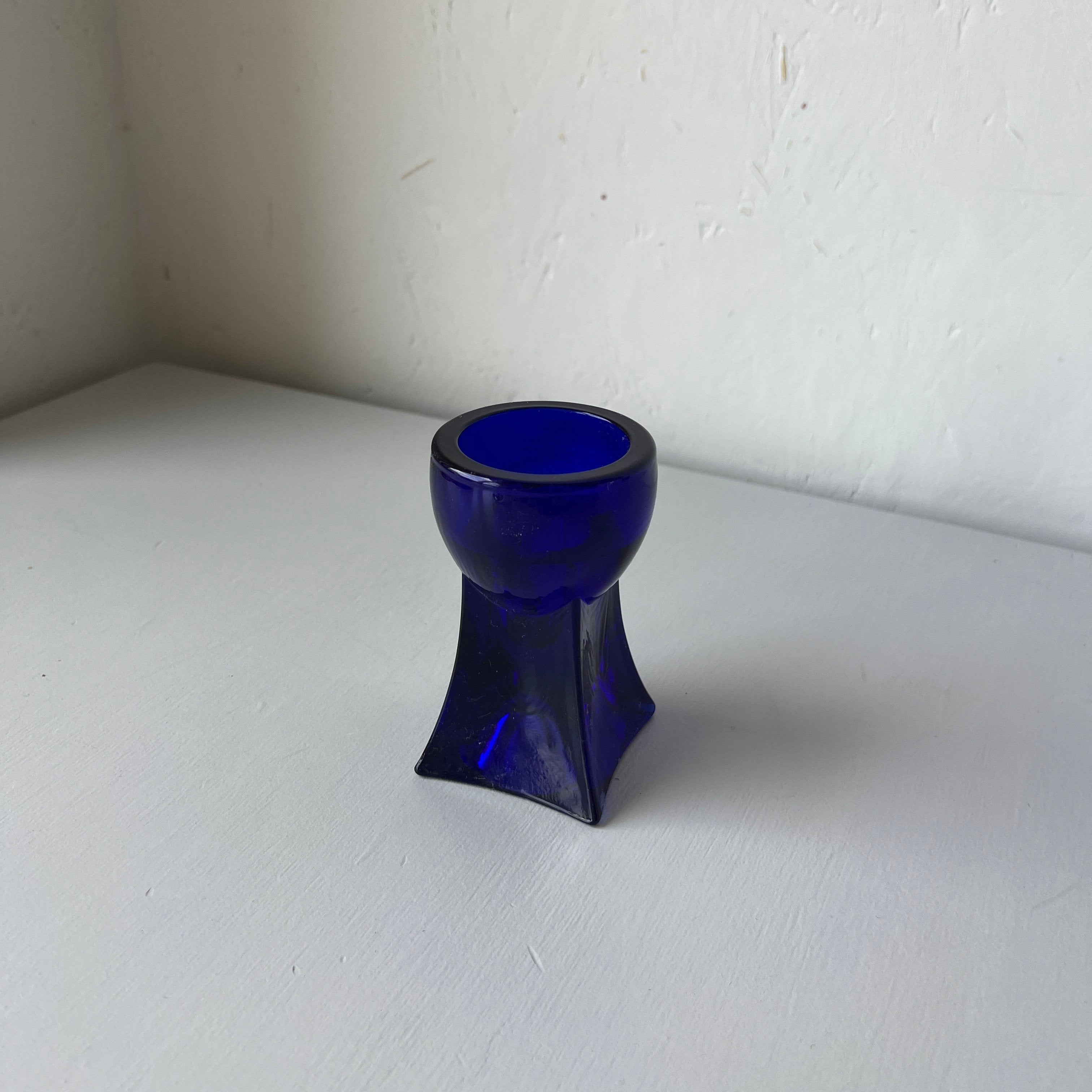 Blue glass candle holder