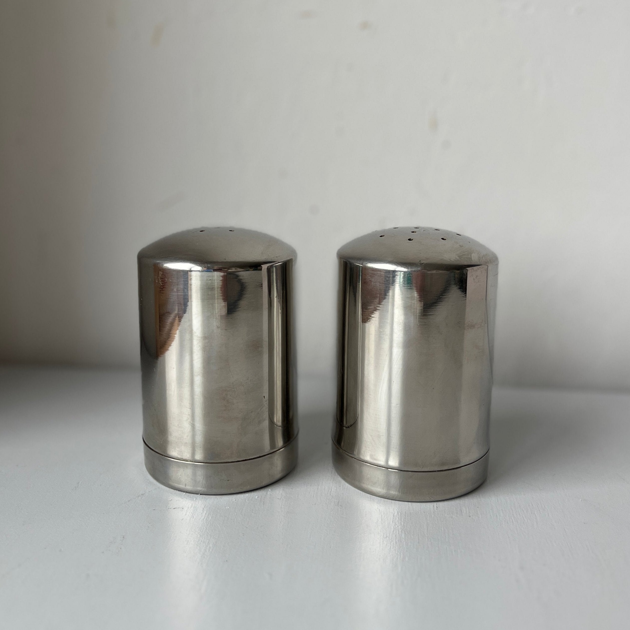 Stainless steel pepper and salt shakers