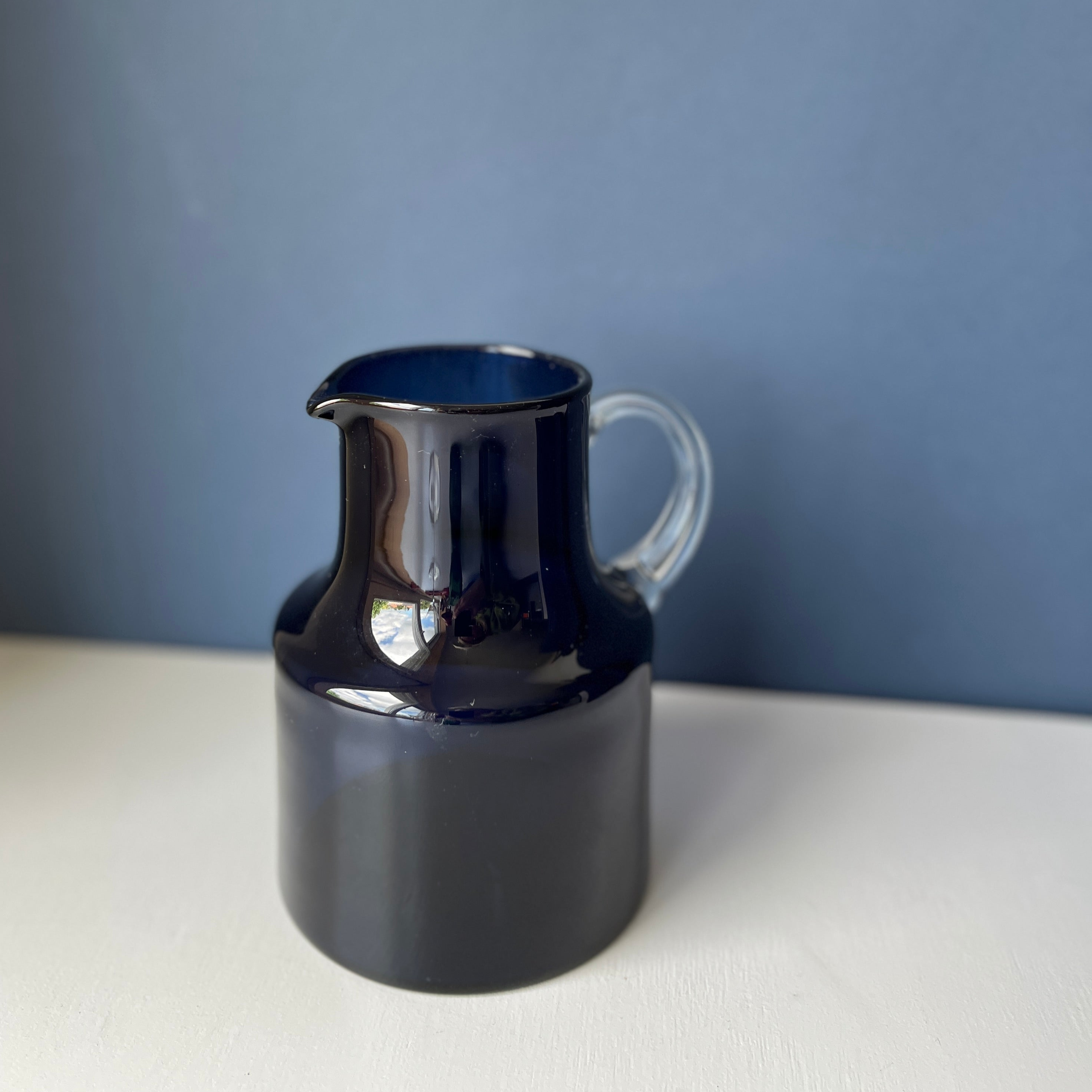 Blue vintage glass jug