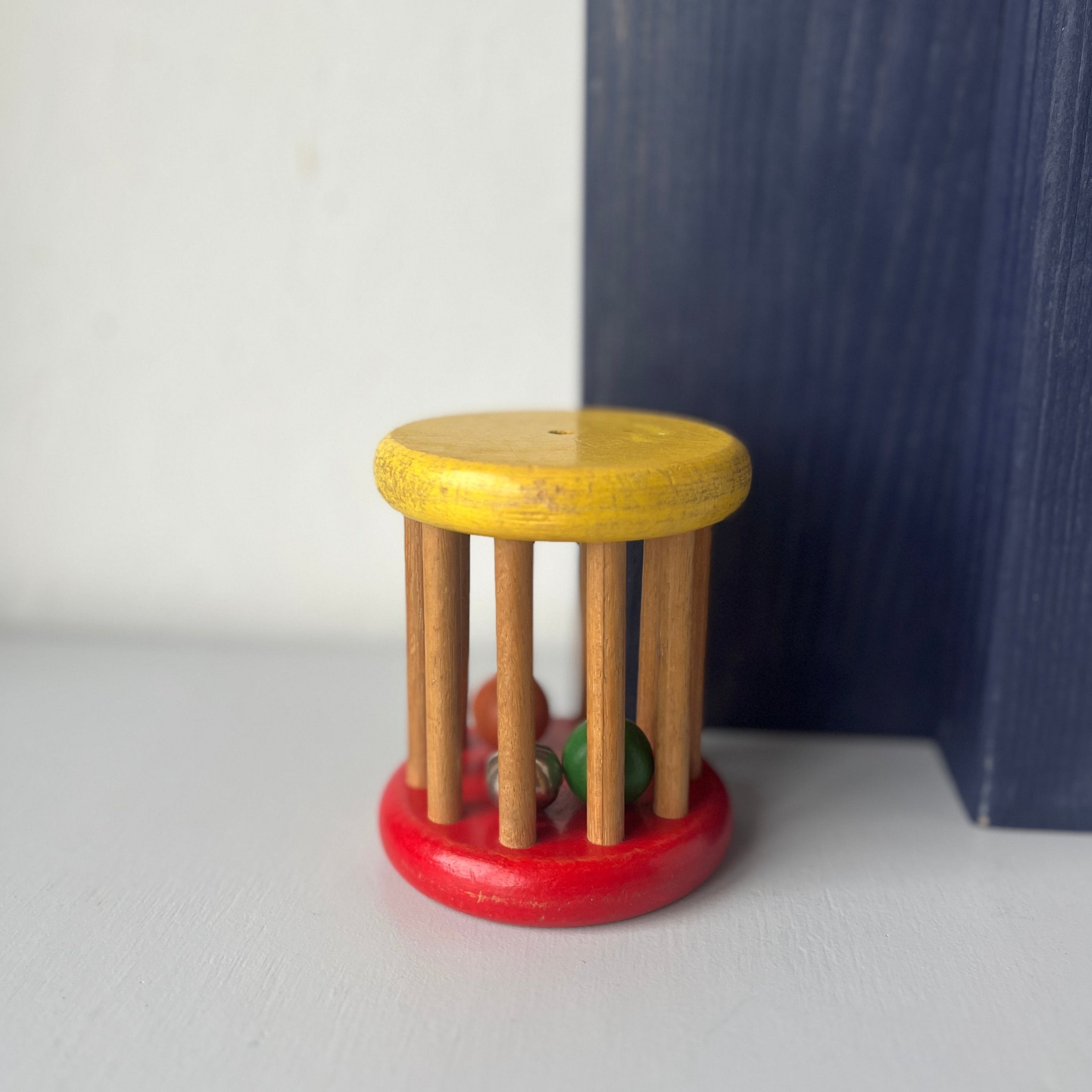 Wooden vintage baby rattle