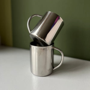 Set of two vintage stainless steal mugs