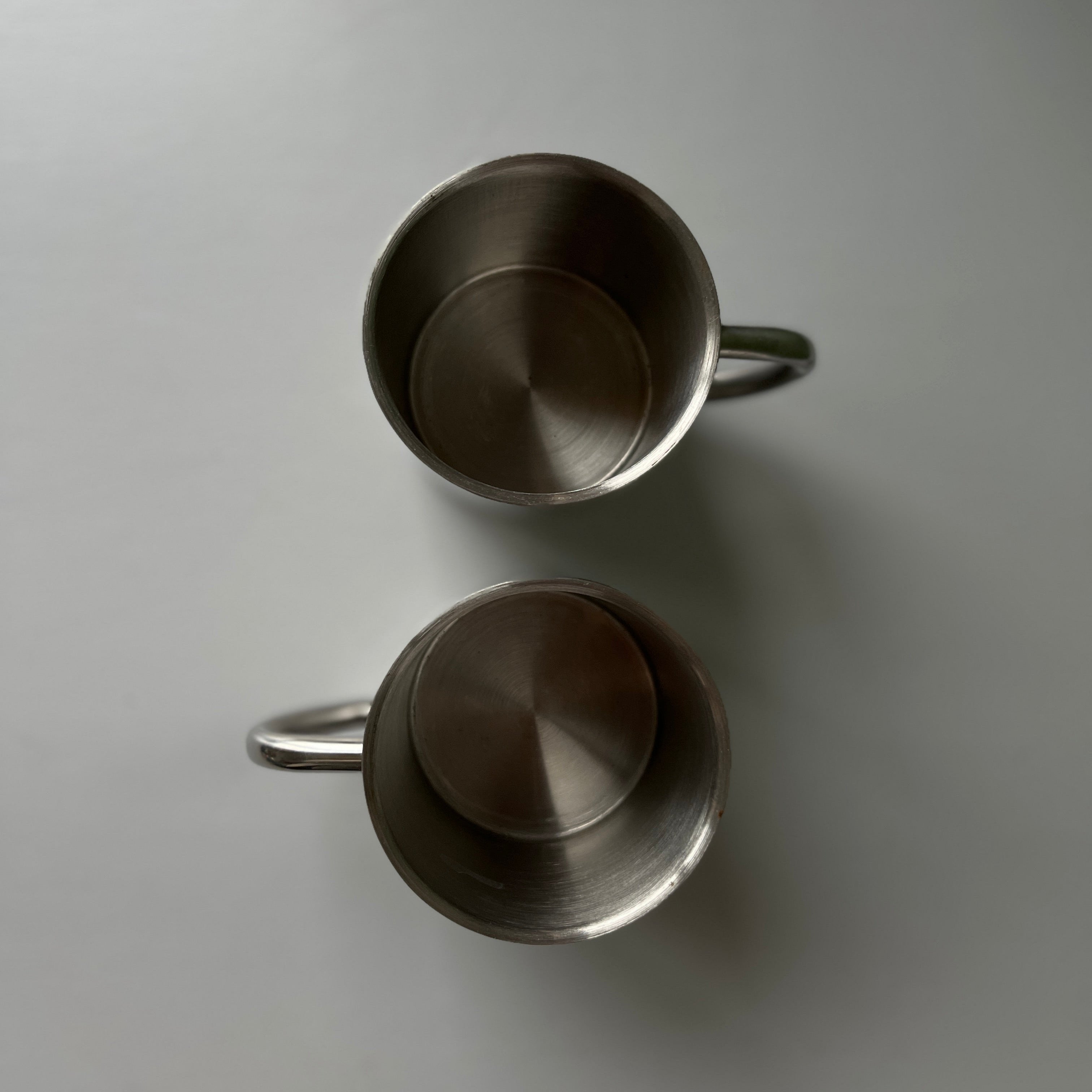 Set of two vintage stainless steal mugs