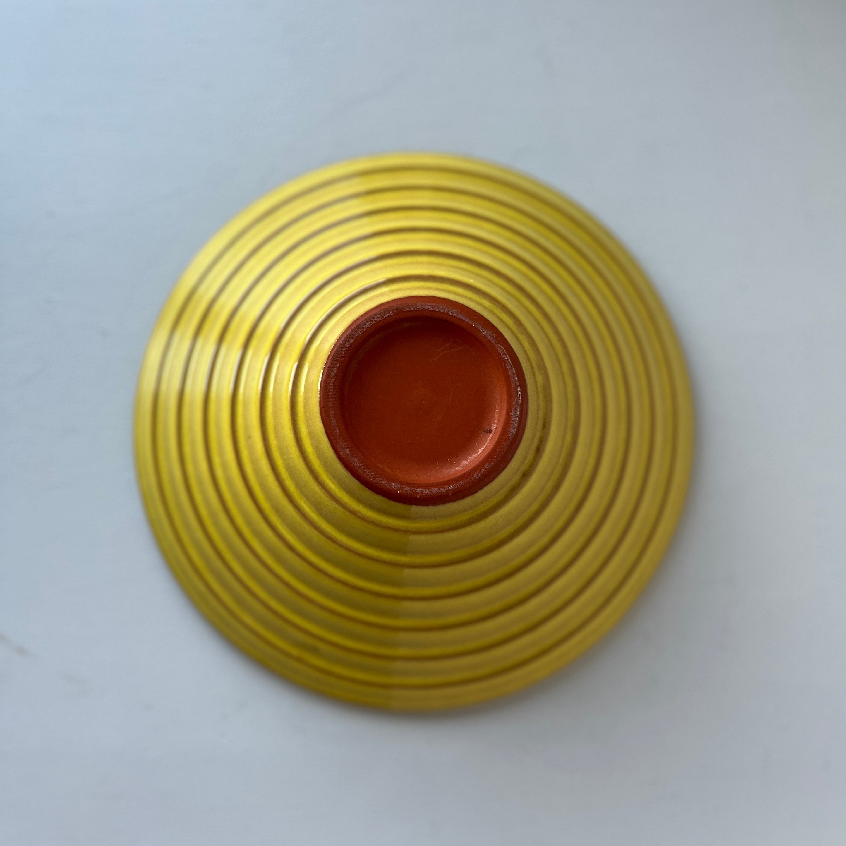 Vintage yellow terracotta bowl