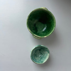 Set of green handmade bowls