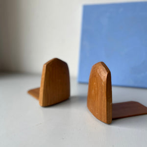 Two vintage wooden bookends