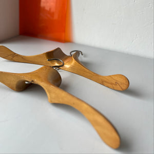 Two vintage wooden coat hangers