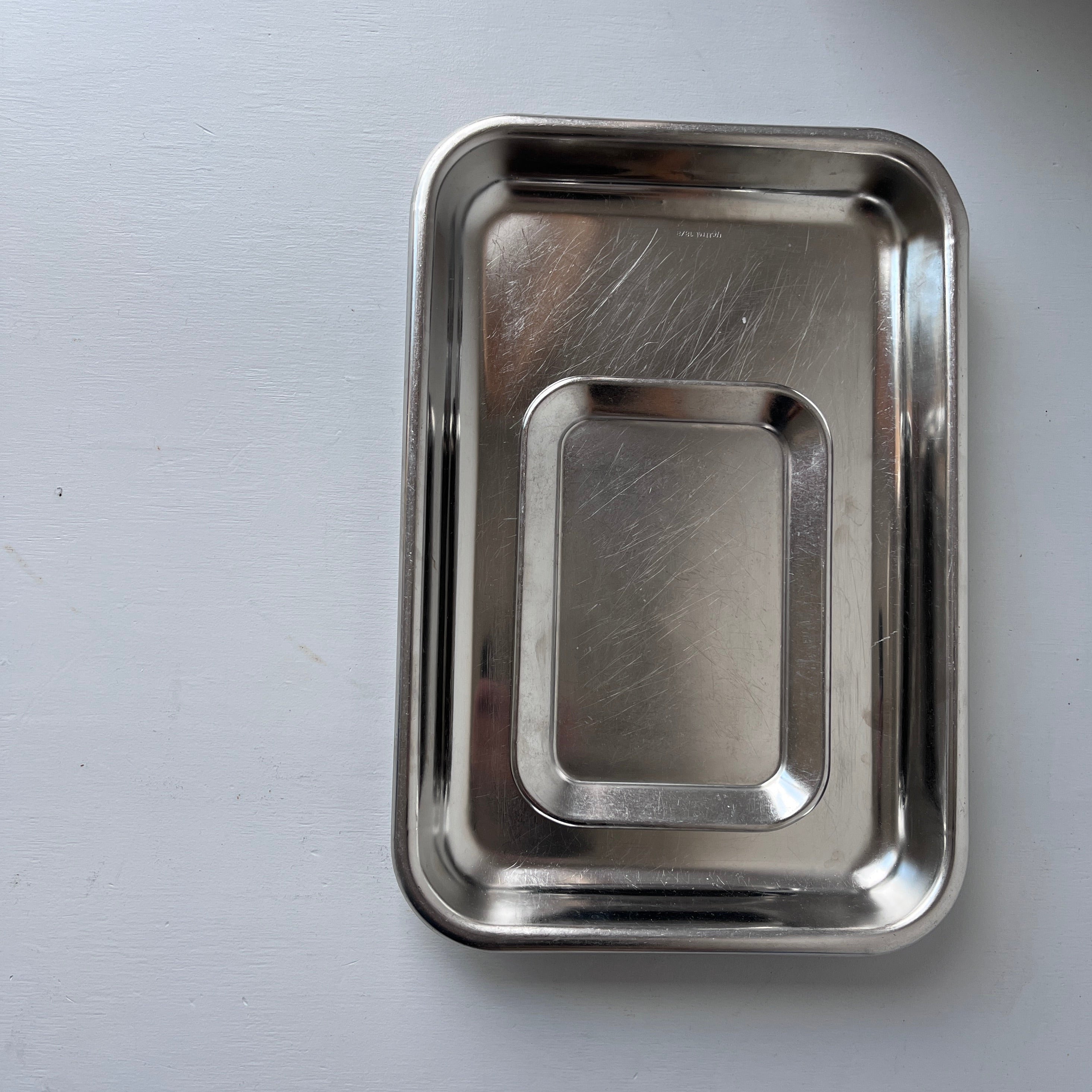 Set of vintage stainless steel serving trays