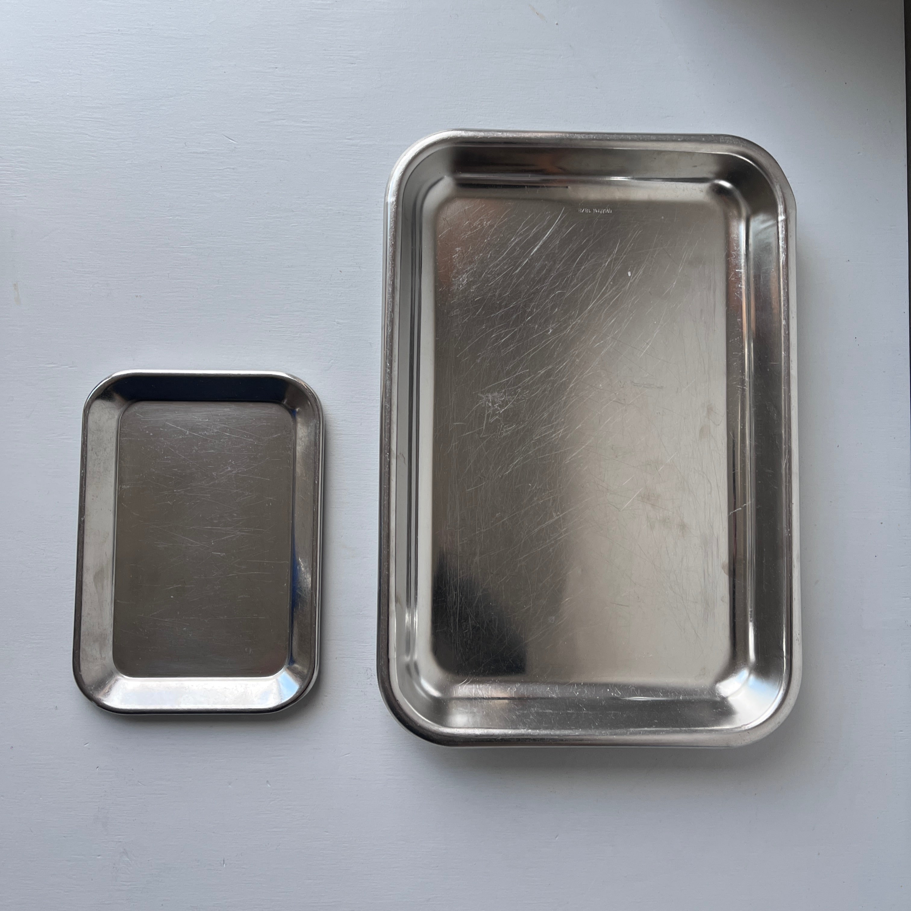 Set of vintage stainless steel serving trays