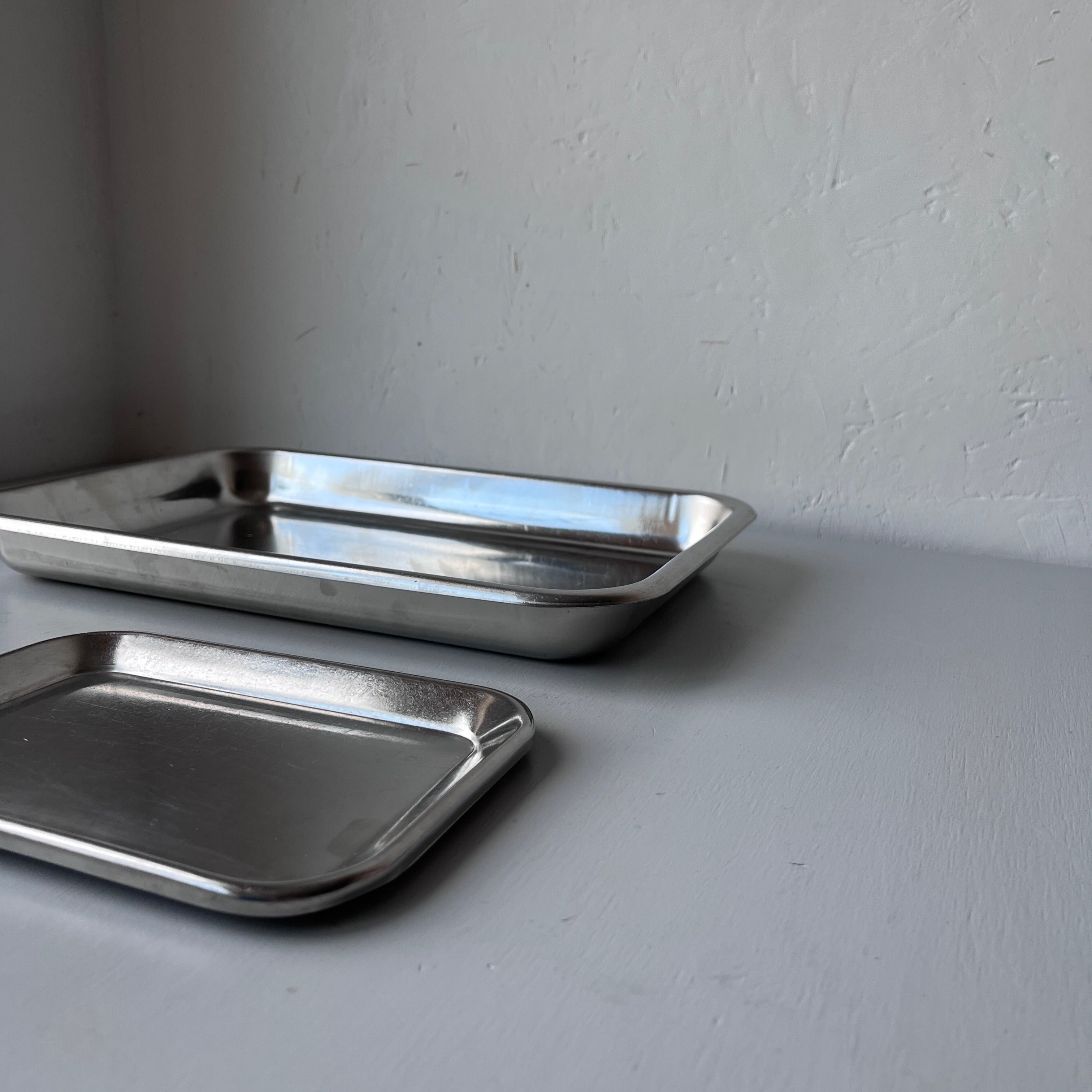 Set of vintage stainless steel serving trays