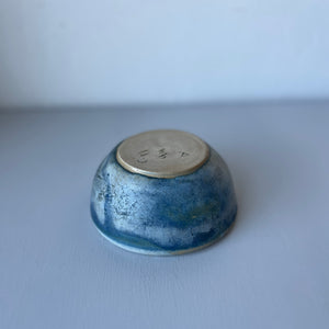 Little ceramic vintage bowl with sun