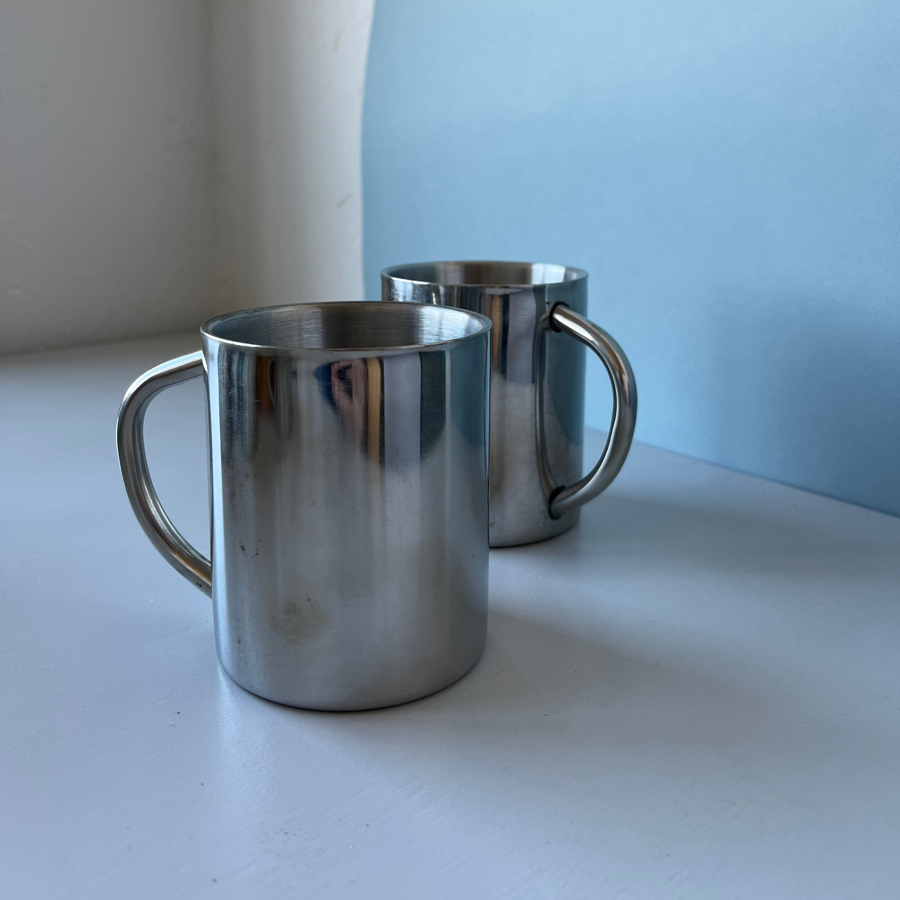 Set of two vintage stainless steal mugs