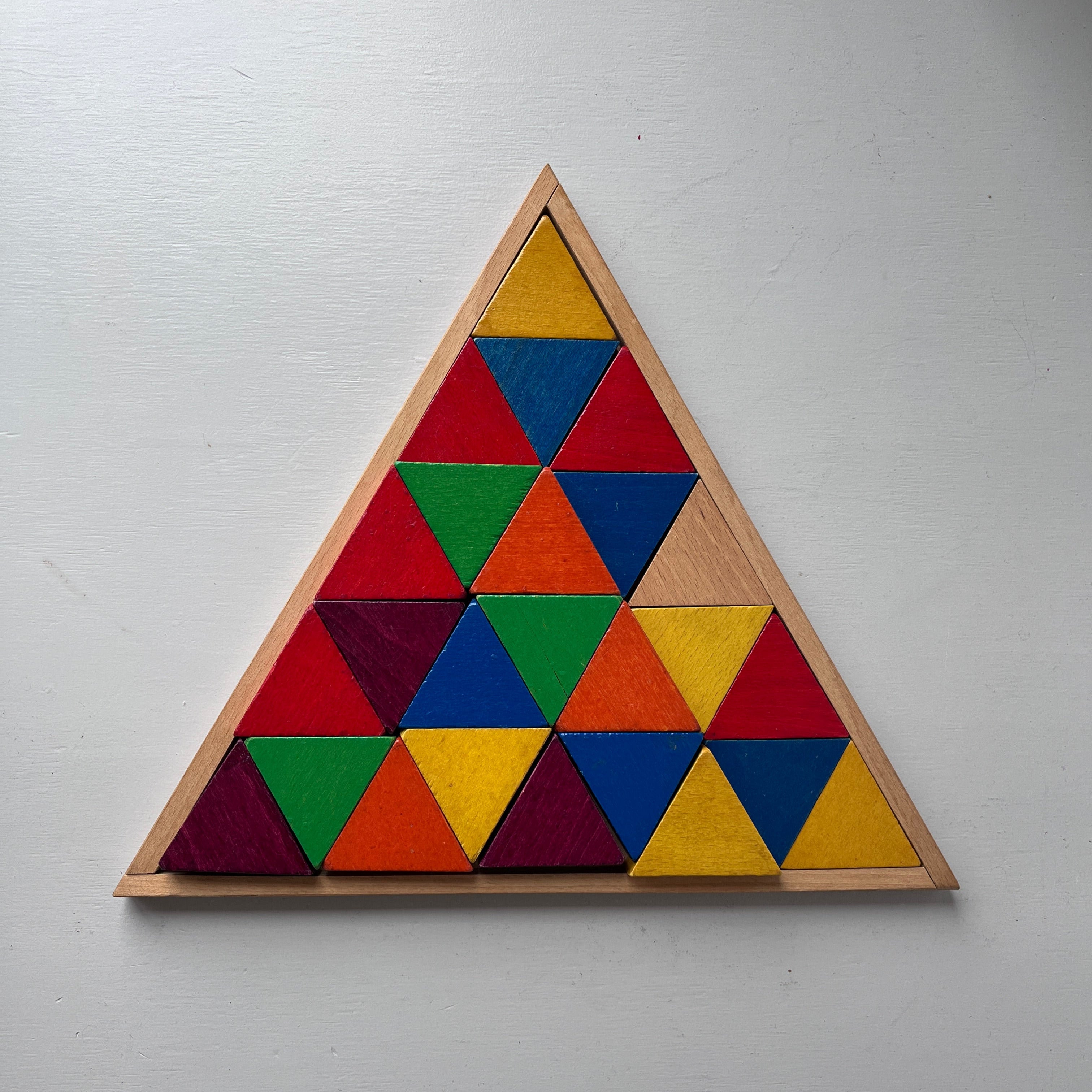 Wooden vintage triangle puzzle