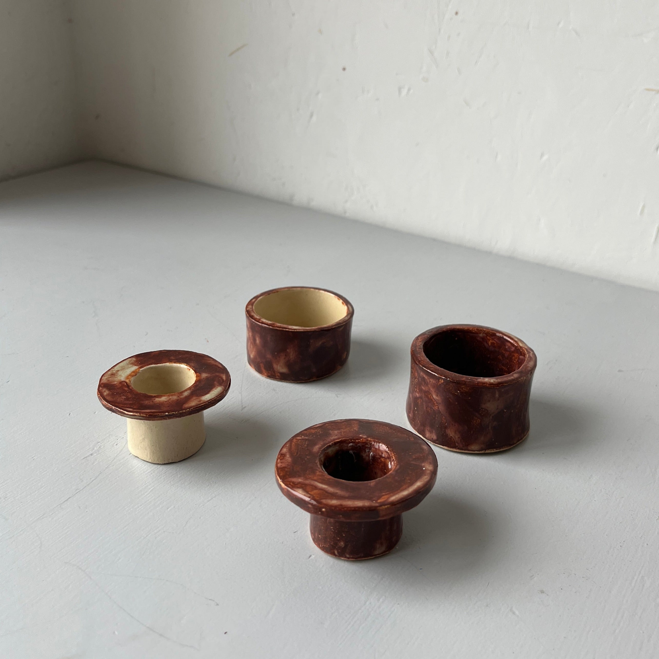 Two handmade ceramic candle holders