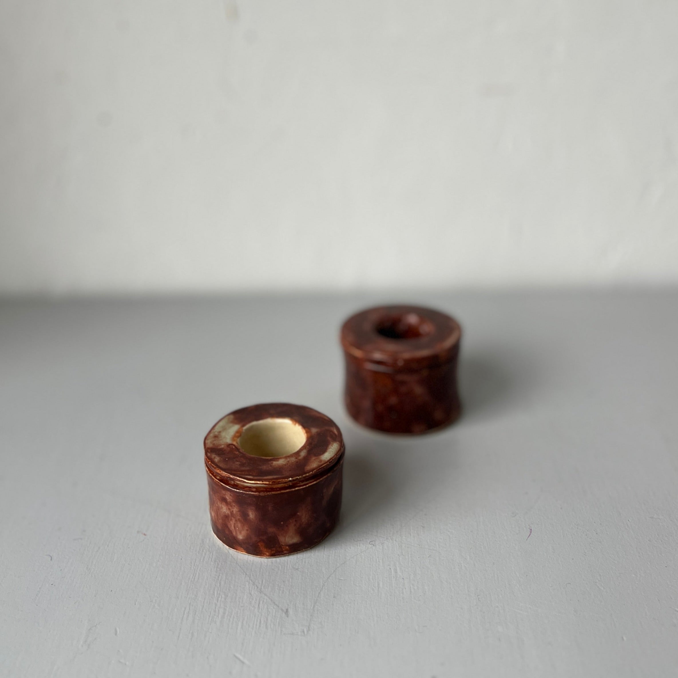 Two handmade ceramic candle holders