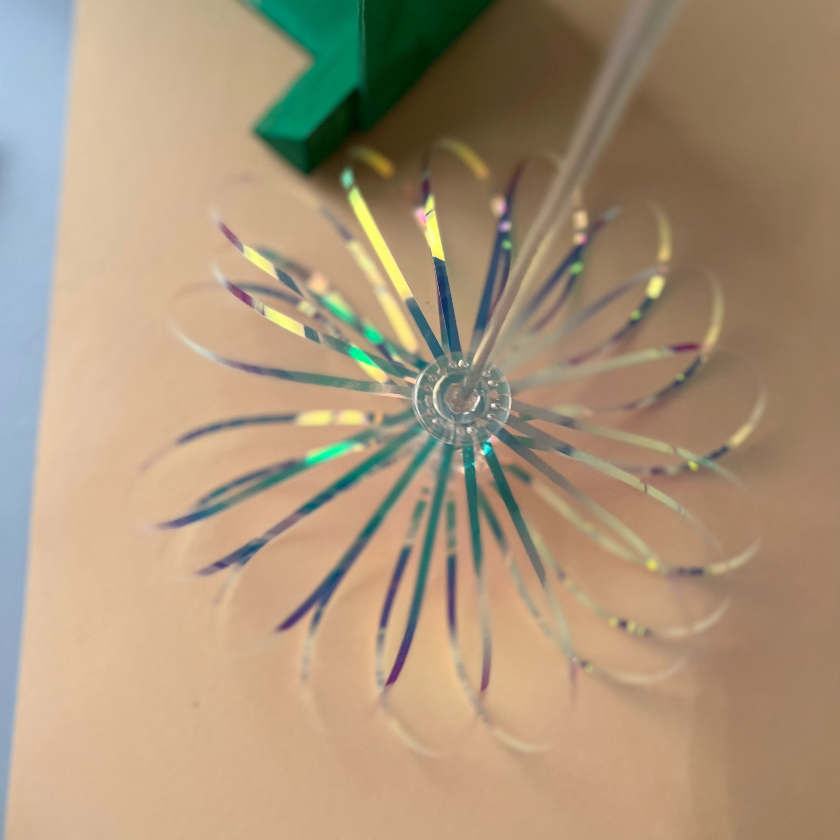 Iridescent spinner