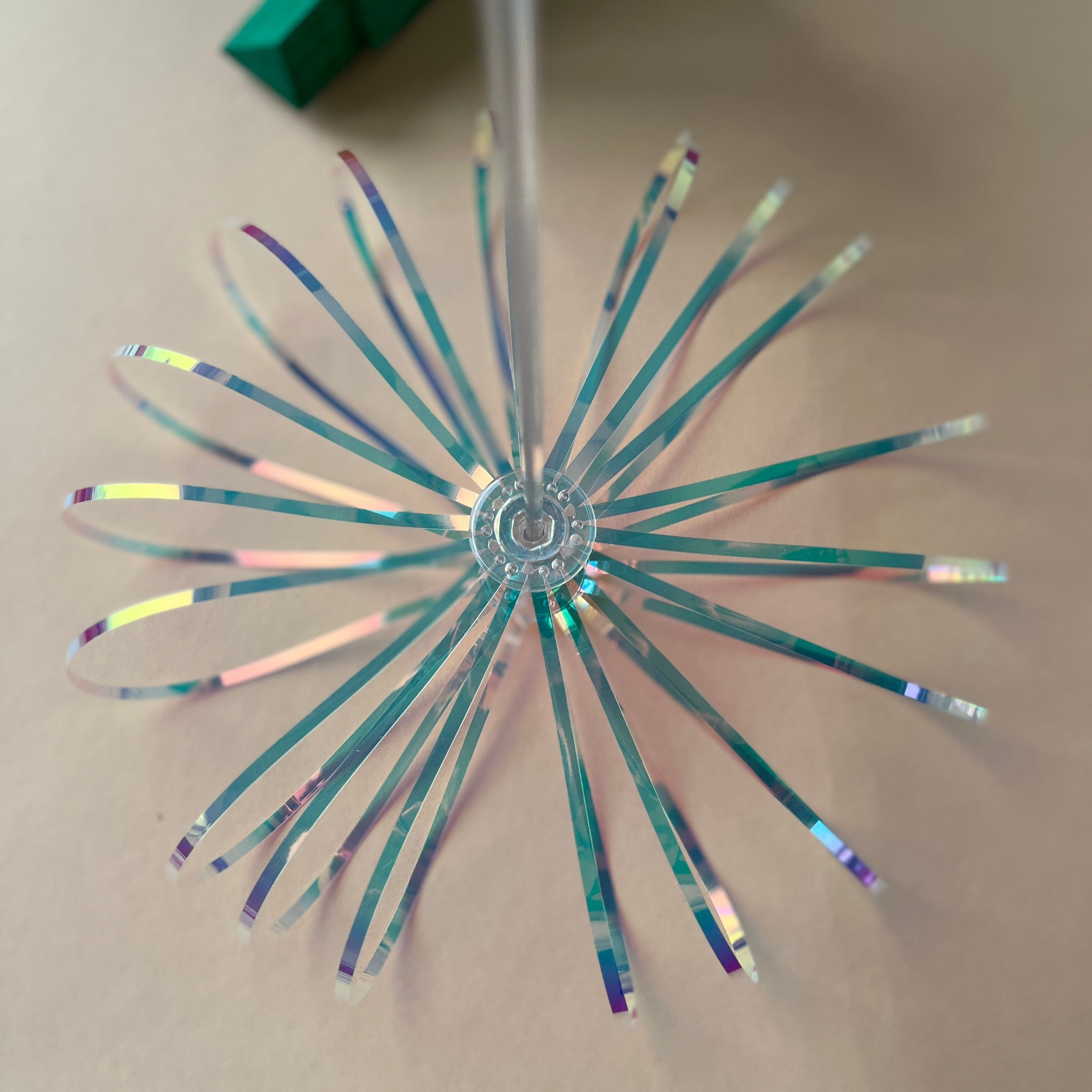 Iridescent spinner