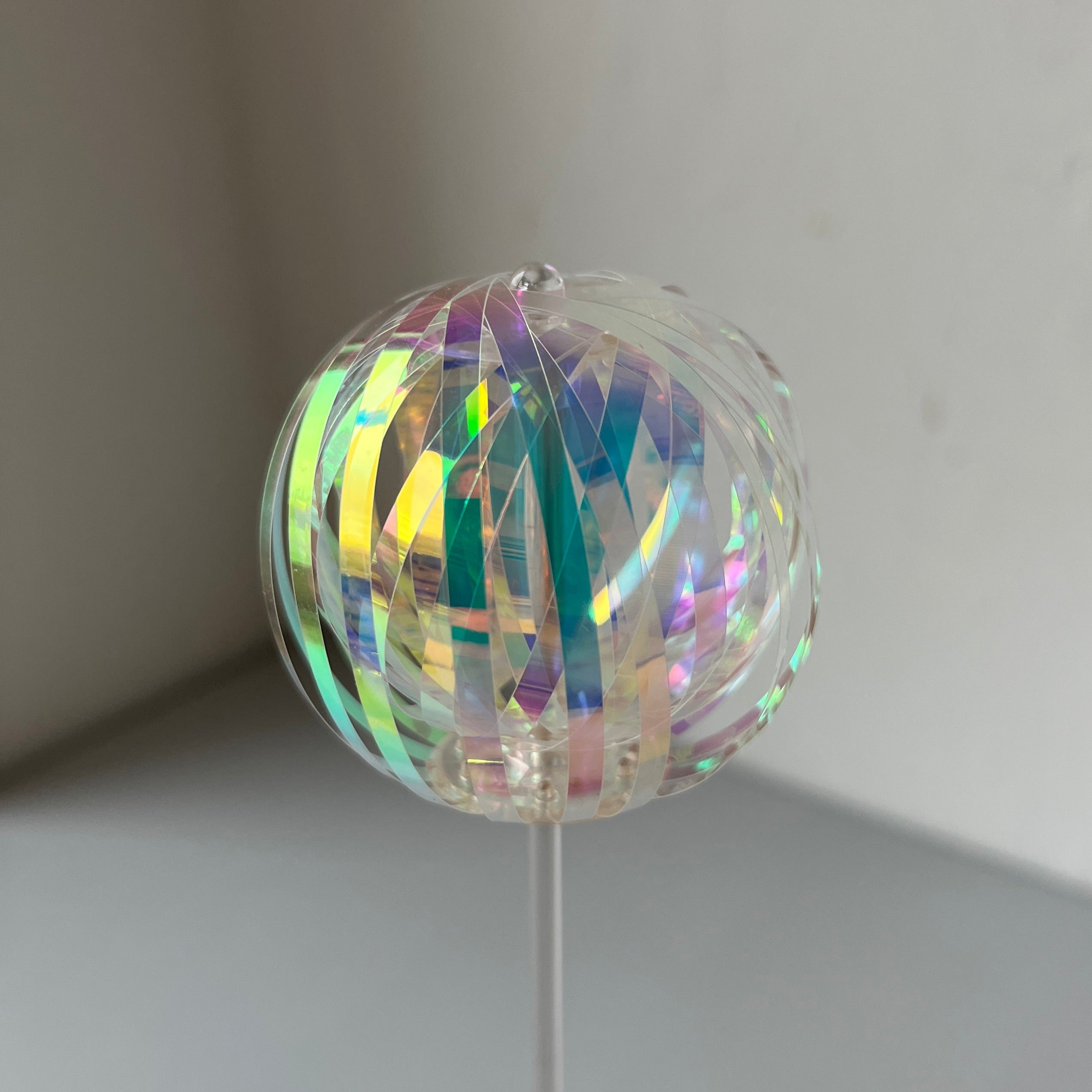 Iridescent spinner