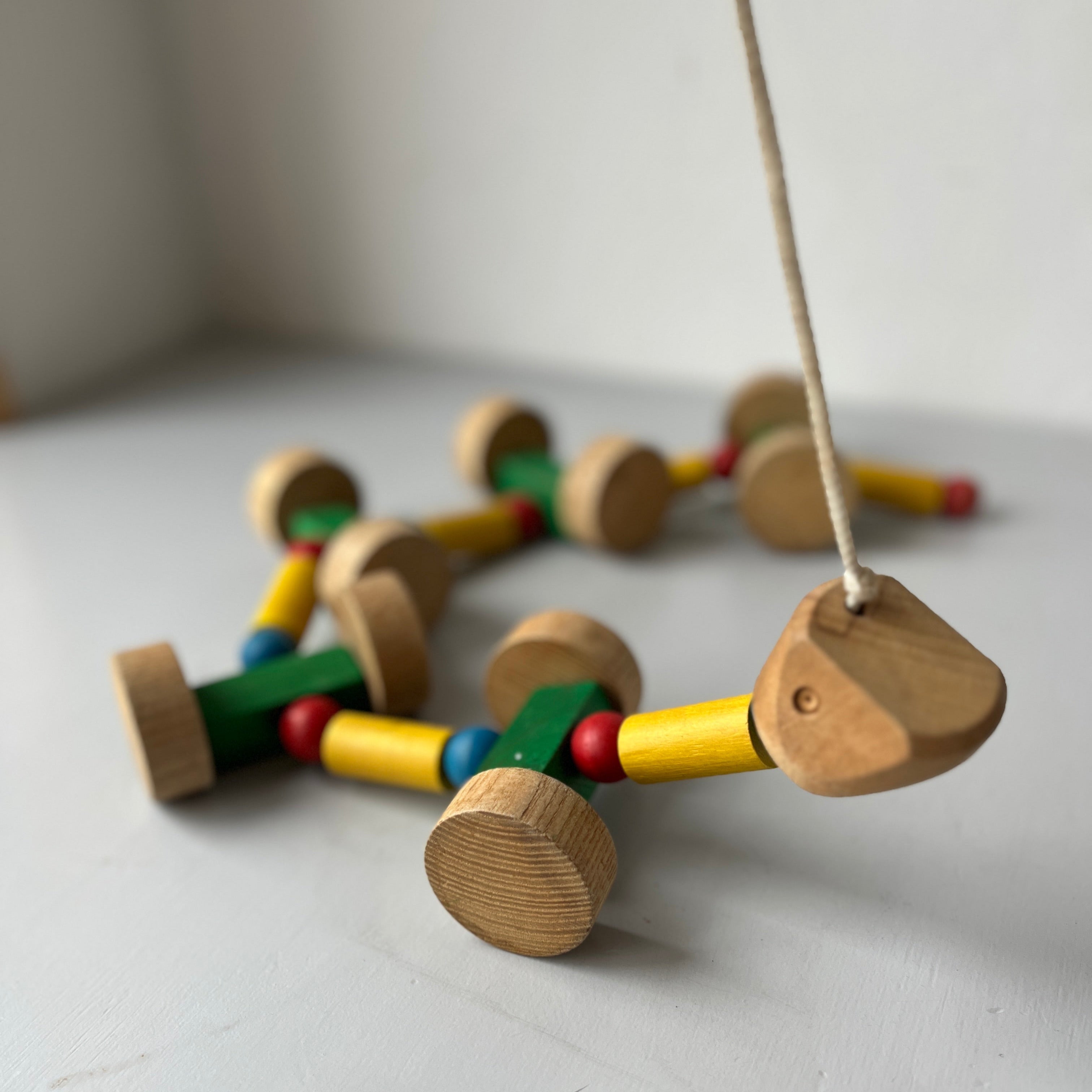 Wooden vintage pull along snake