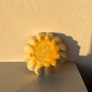 Handmade yellow ceramic bowl.