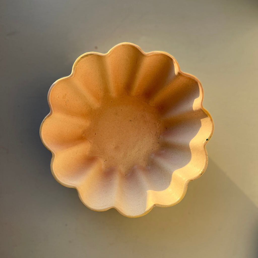 Handmade yellow ceramic bowl.