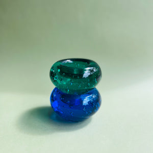 Set of two solid glass candle holders