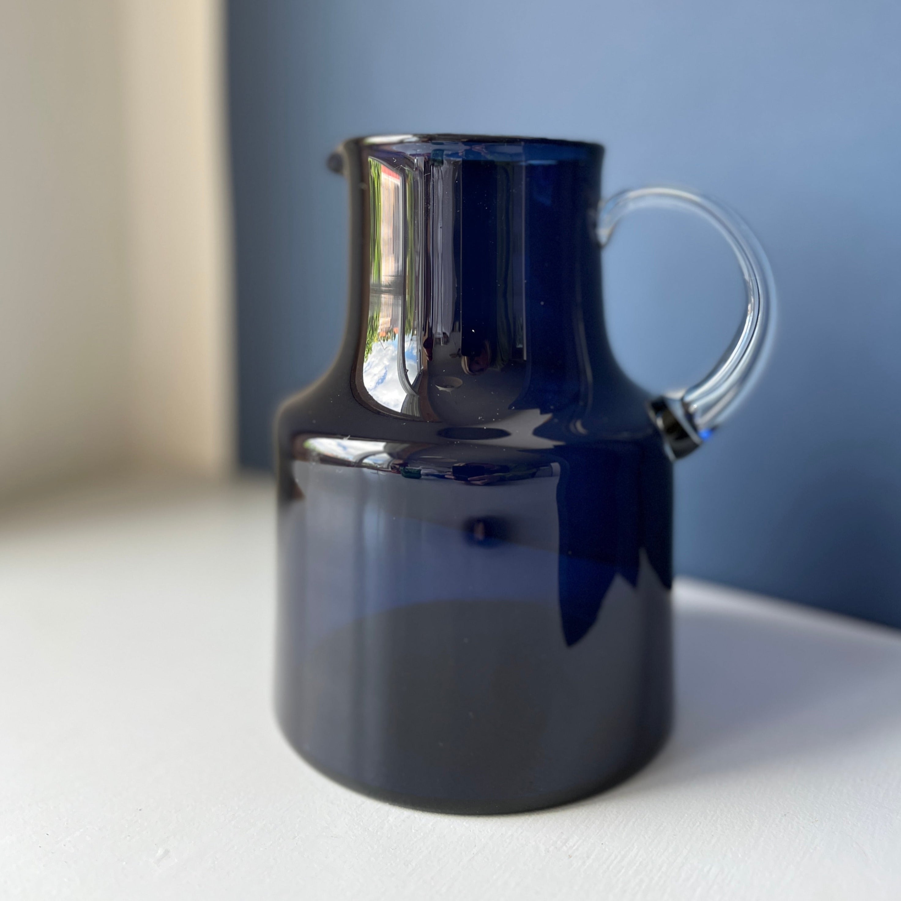 Blue vintage glass jug