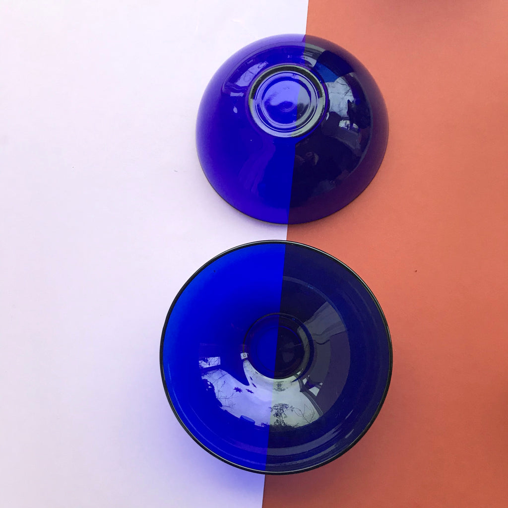 Two vintage blue glass bowls